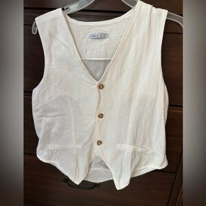 White Sleeveless Button-Up Vest
PRLA brand